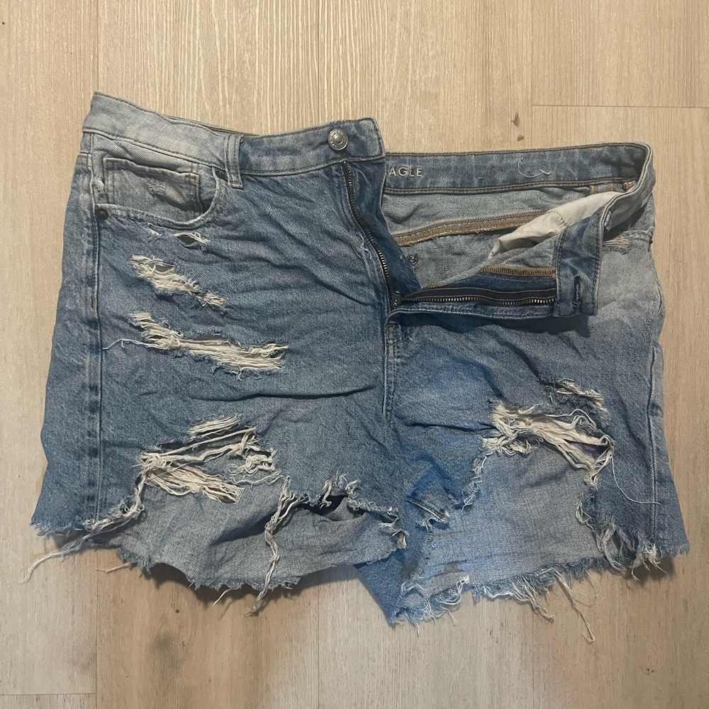 Two pairs of distressed AE Jean Shorts